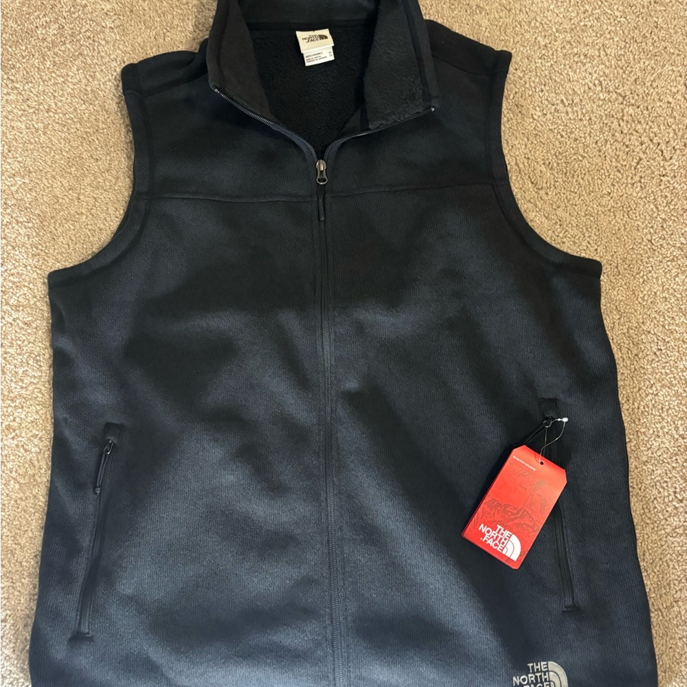 The North Face vest jacket unisex